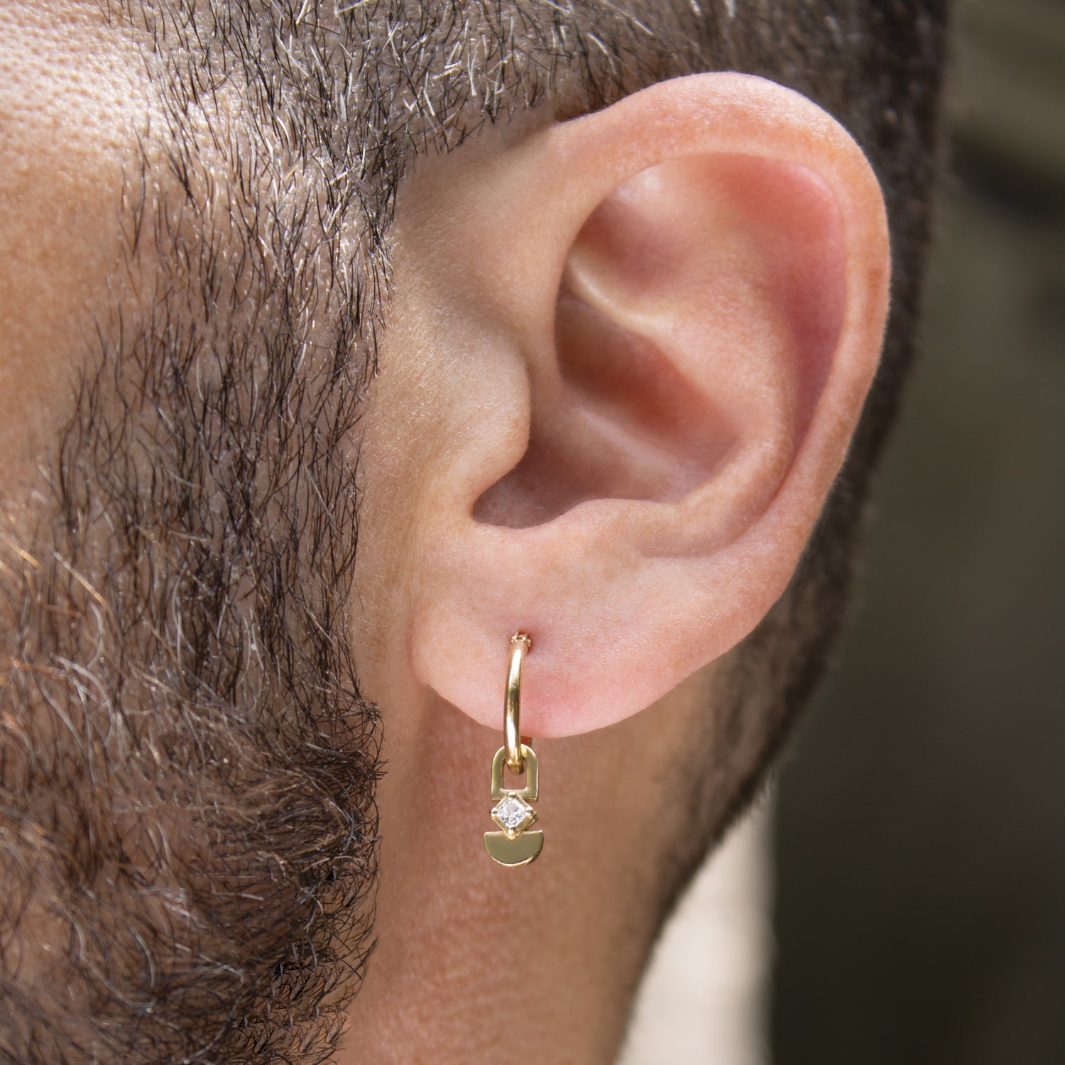 Earth hoop earring in a square